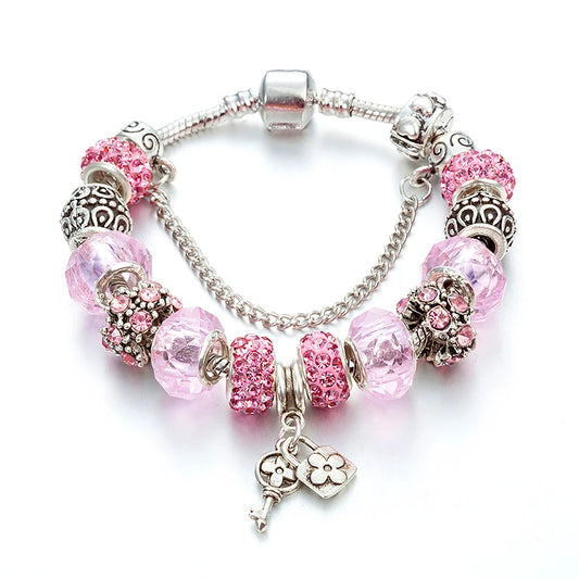 Pink Key Lock Charm Bangles adorned with Crystal Beads, inspired by Abalorio Murano Bracelets.